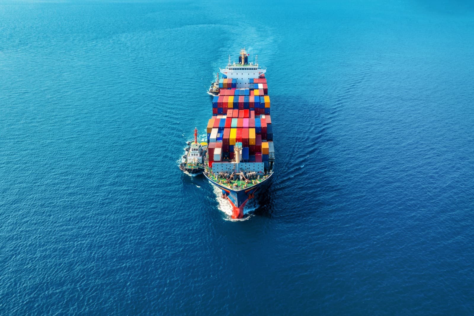 Container ship at sea representing ocean freight and sea cargo
